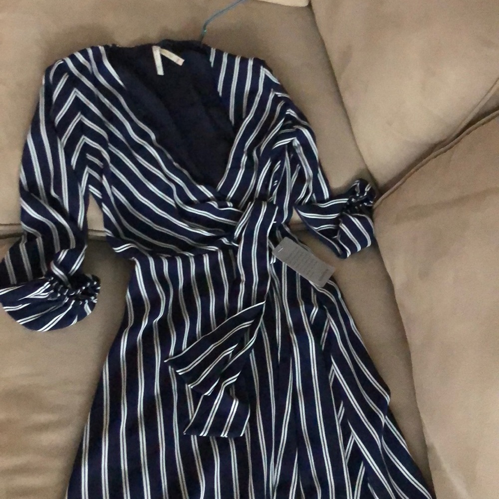 Navy blue wrap dress. Never worn. With tags.